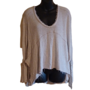 Free People oversized waffle knit print / textured top. Size small.